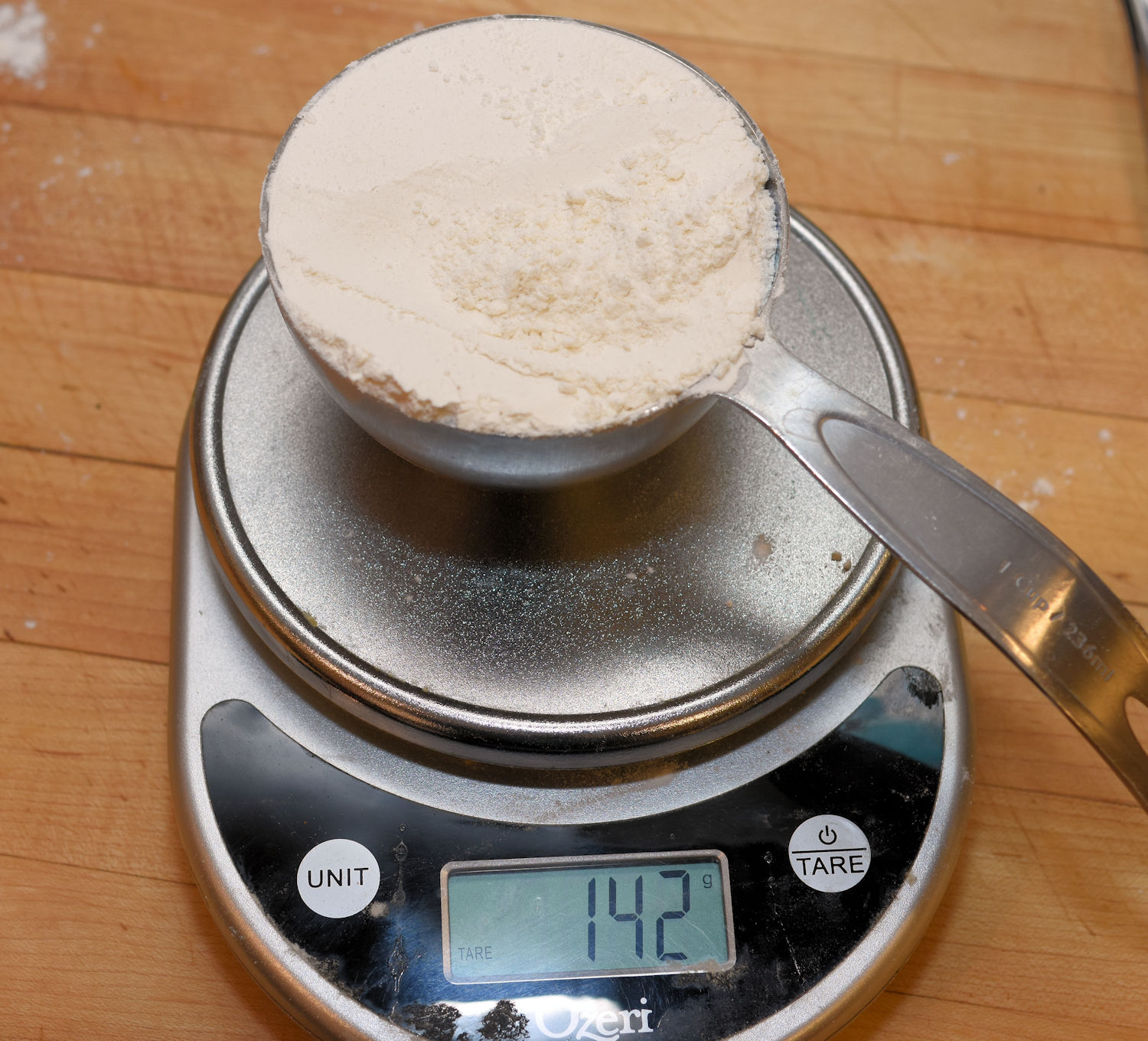 Sifting and measuring flour Food Science Institute
